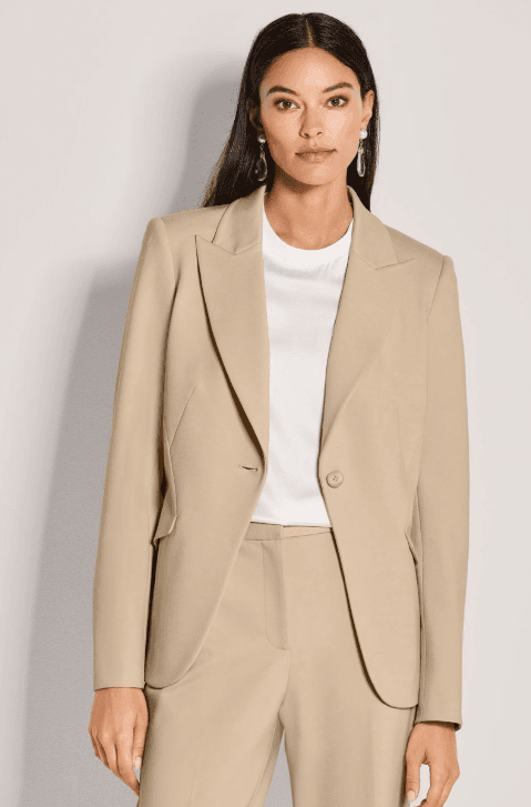 Beige tailored blazer worn on model