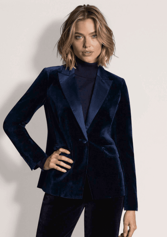Navy velvet blazer worn on model